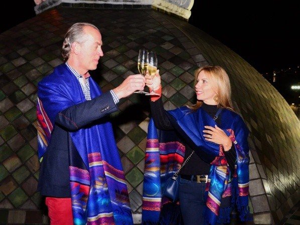 A toast on a rooftop over colonial Quito