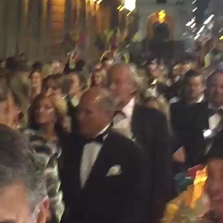 Wedding guests in the streets of the historic center at night